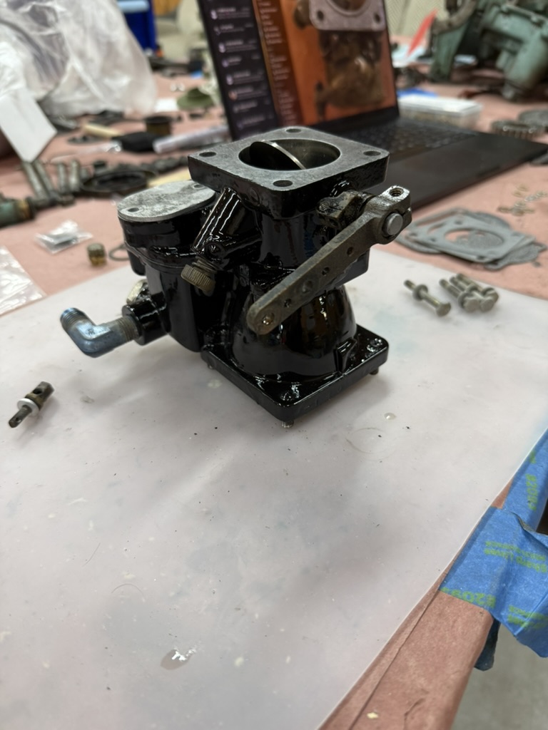Carburetor reassembled with throttle linkage