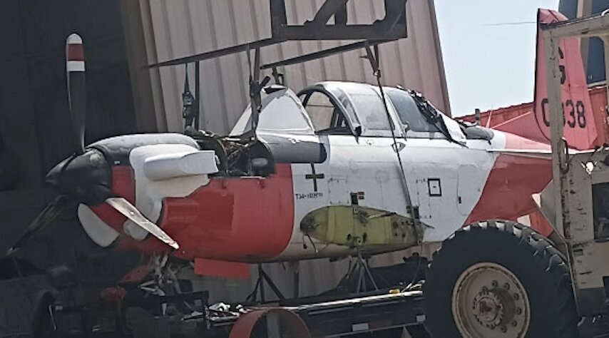 Vintage aircraft under teardown for restoration